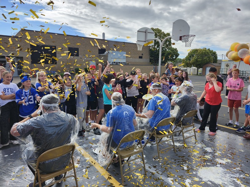 Principal, Vice Principal and PE coach getting pied in on the playground watched by students