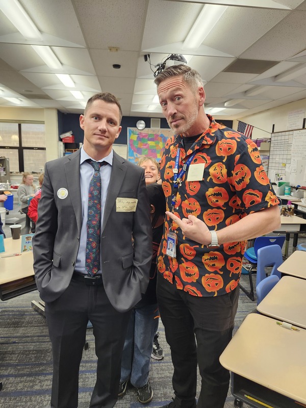 Mr. Danny and Mr. Nash dressed up as each other at a Halloween party.