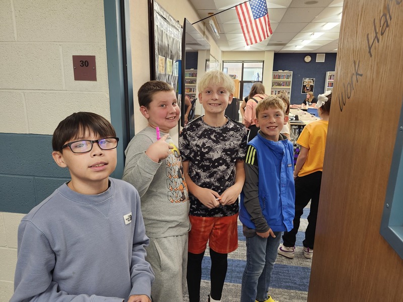 Students playing a game at a Halloween party.
