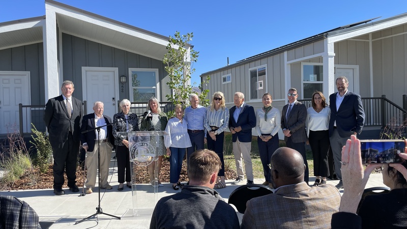 speakers at press conference