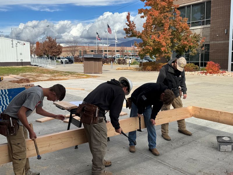 students starting to build the foundation of home #5 for the other side village