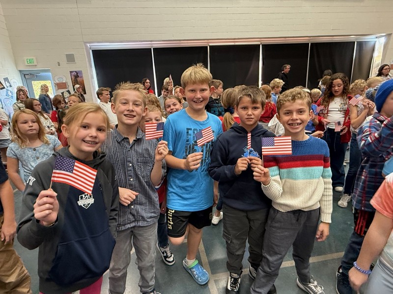 students holding flags