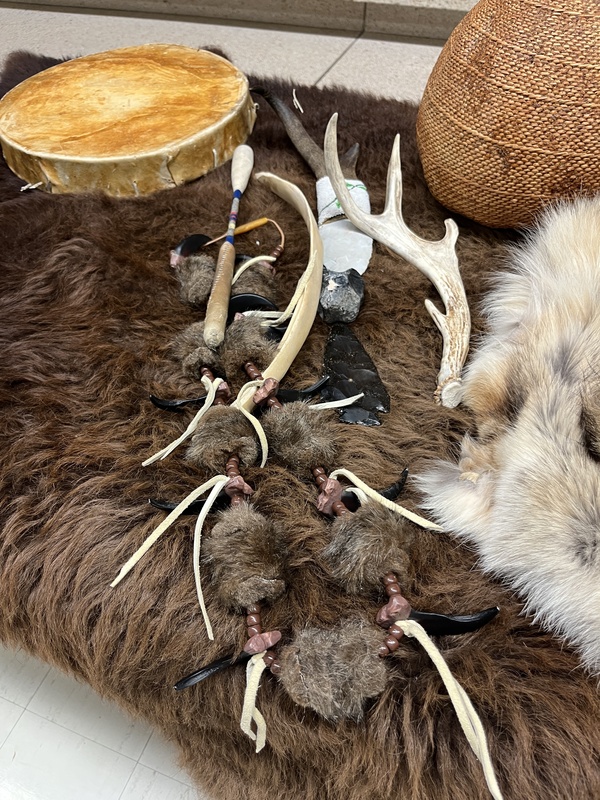 Authentic Native American buffalo skin, deer skin drum, antlers, flint knife, bear claw necklace