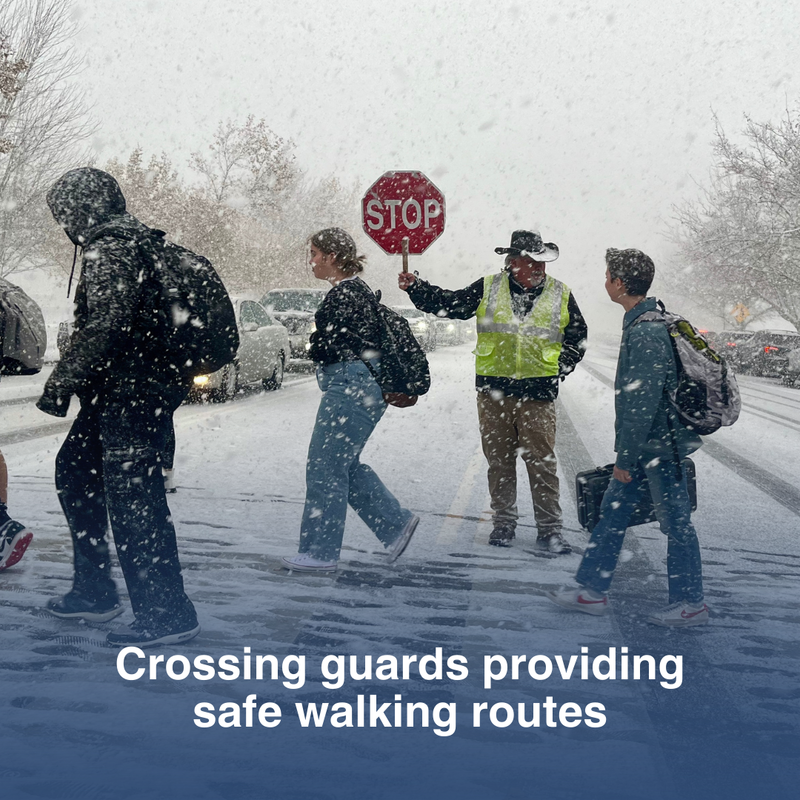 Crossing guards providing safe walking routes