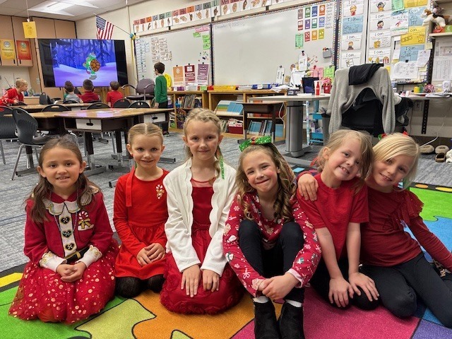 1st grade girls in their classroom, dressed up for the play