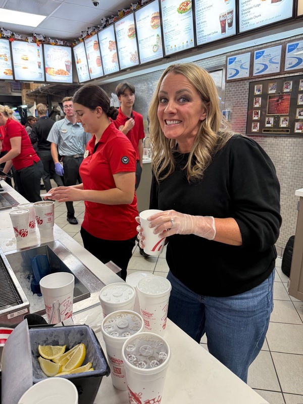 PTO mom helping at Chick Fil A restaurant