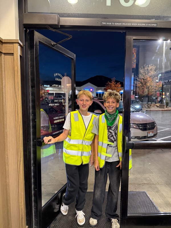 Students helping deliver food to customers