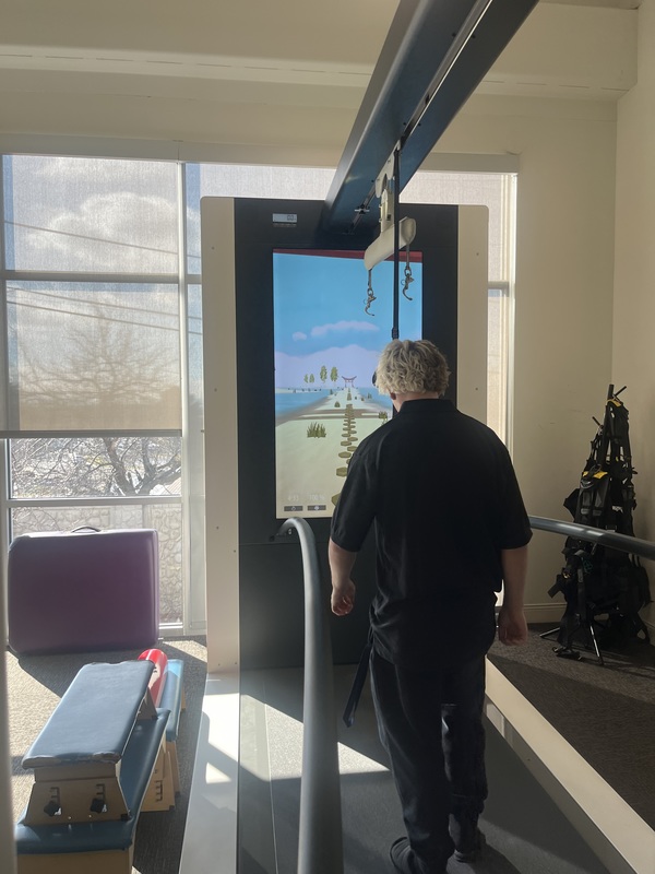 Student using rehabilitation treadmill