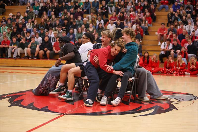 Students playing musical chairs