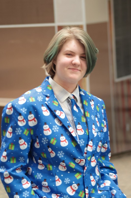 student in a full suite that has snowman on it