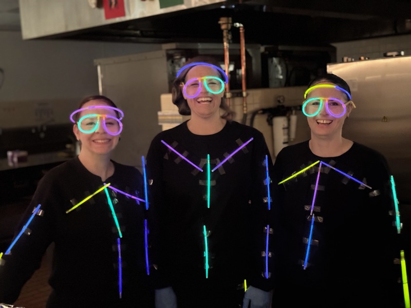 Lunch ladies festively dressed up for holiday shenanigans