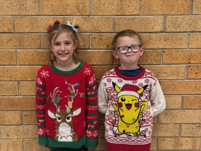 Students in holiday sweaters