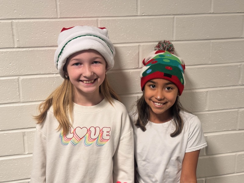 Students in holiday headwear