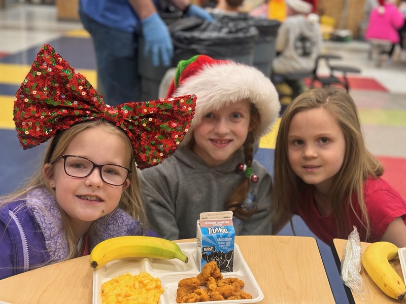 Students in holiday headwear