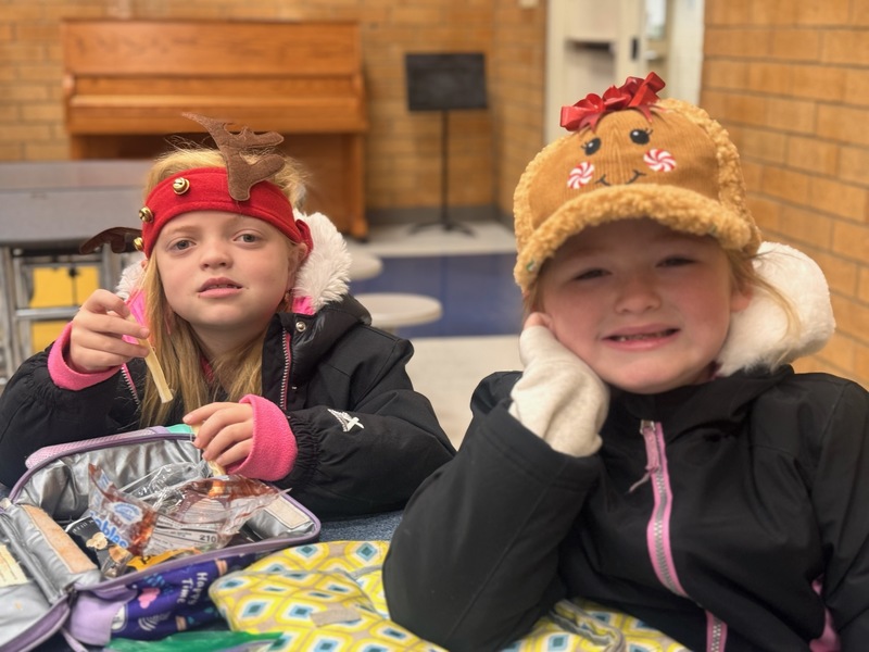 Students in holiday headwear