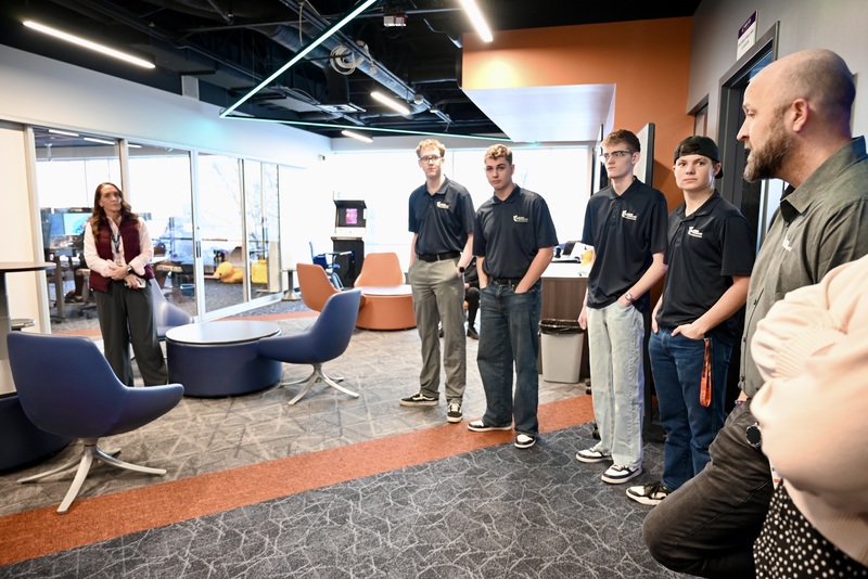 Students demonstrating an AI engineering project