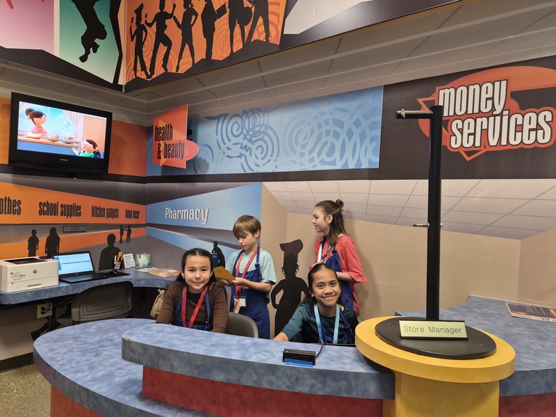 Students at JA City, a work simulation experience.