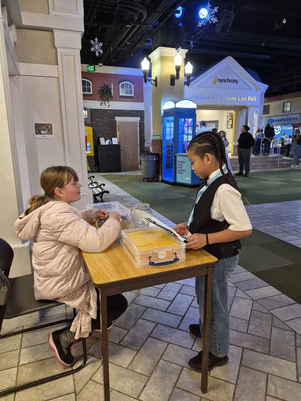 Students at JA City, a work simulation experience.