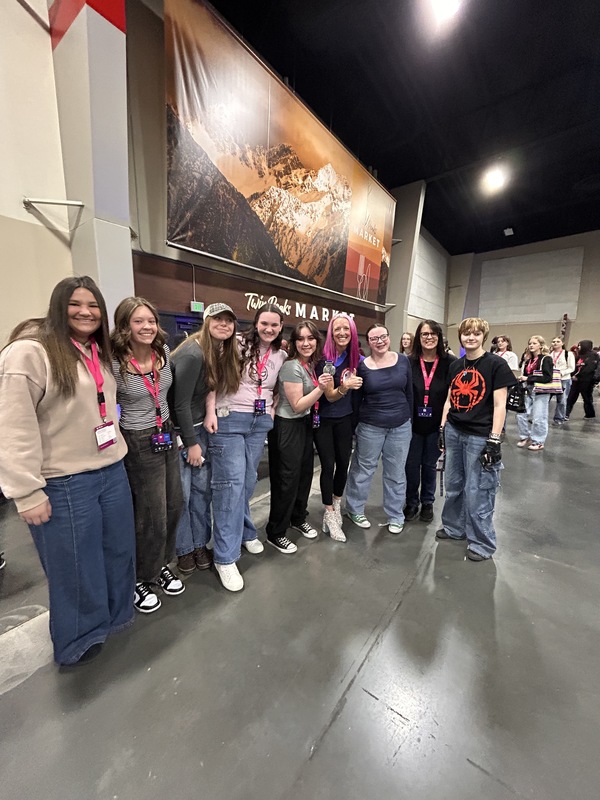 Students standing with Olympic Silver-Medalist, Shannon Bahrke-Happe.