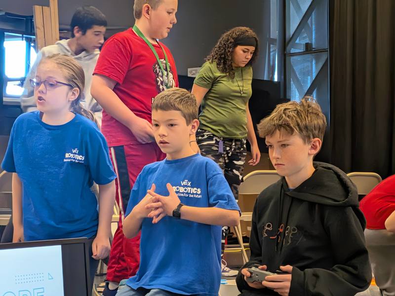 Upper grade students at the robotics competition.