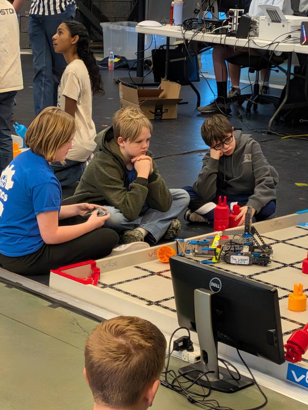 Upper grade students at the robotics competition.