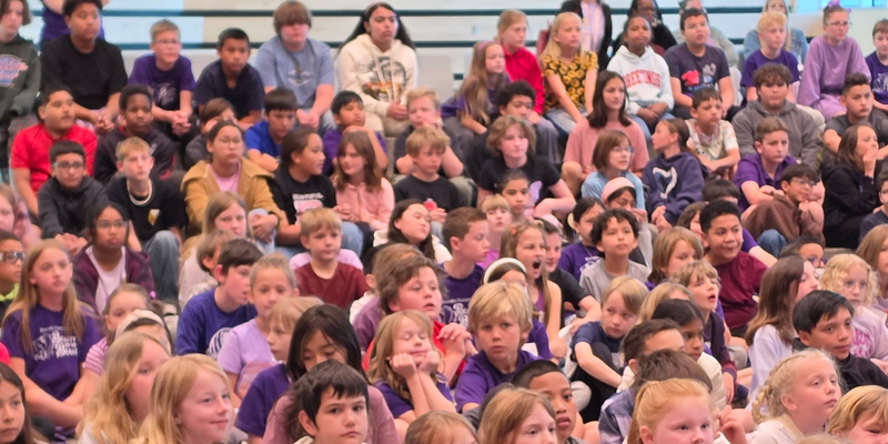 Bountiful Elementary students wearing purple for Purple Up day during the One Book One Bountiful Assembly