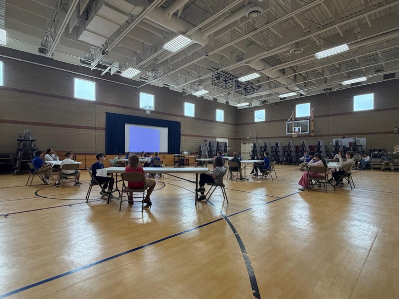 Students testing at the math olympiad.