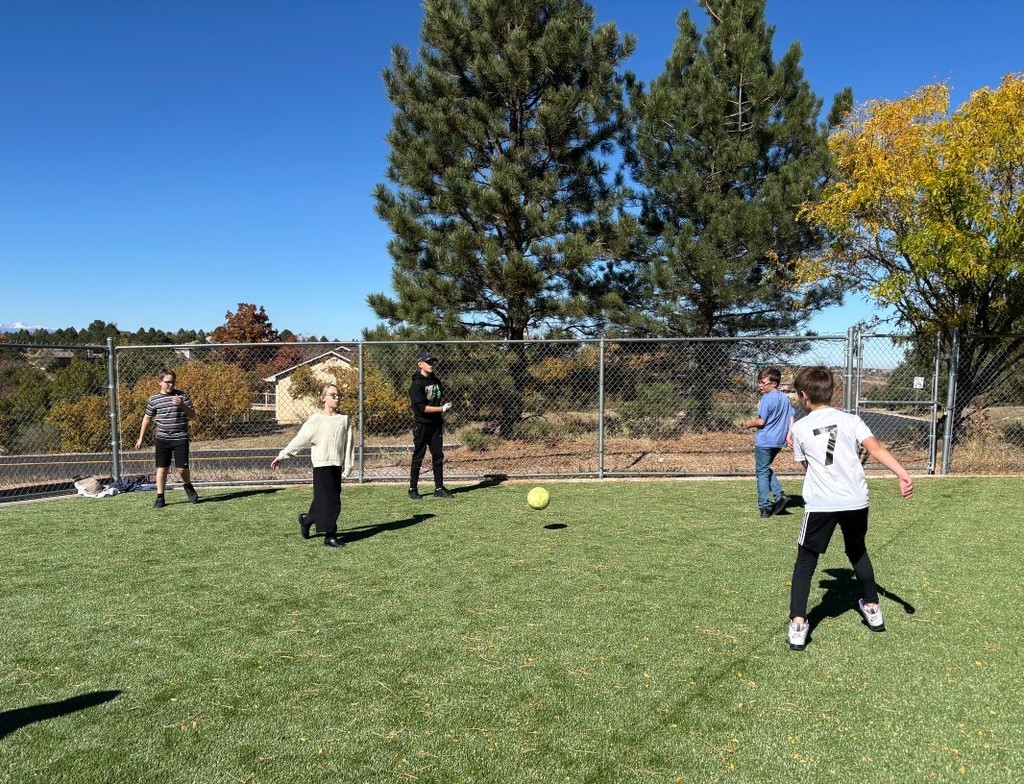 Students playing soccer
