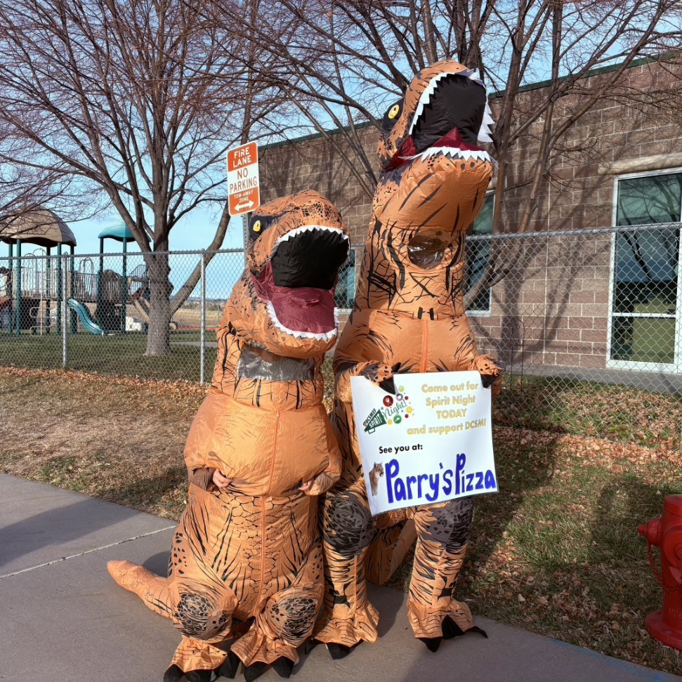 Trees holding a sign