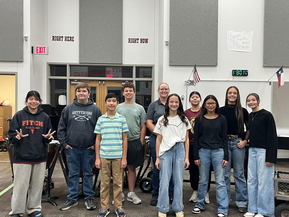 middle school band members in band hall