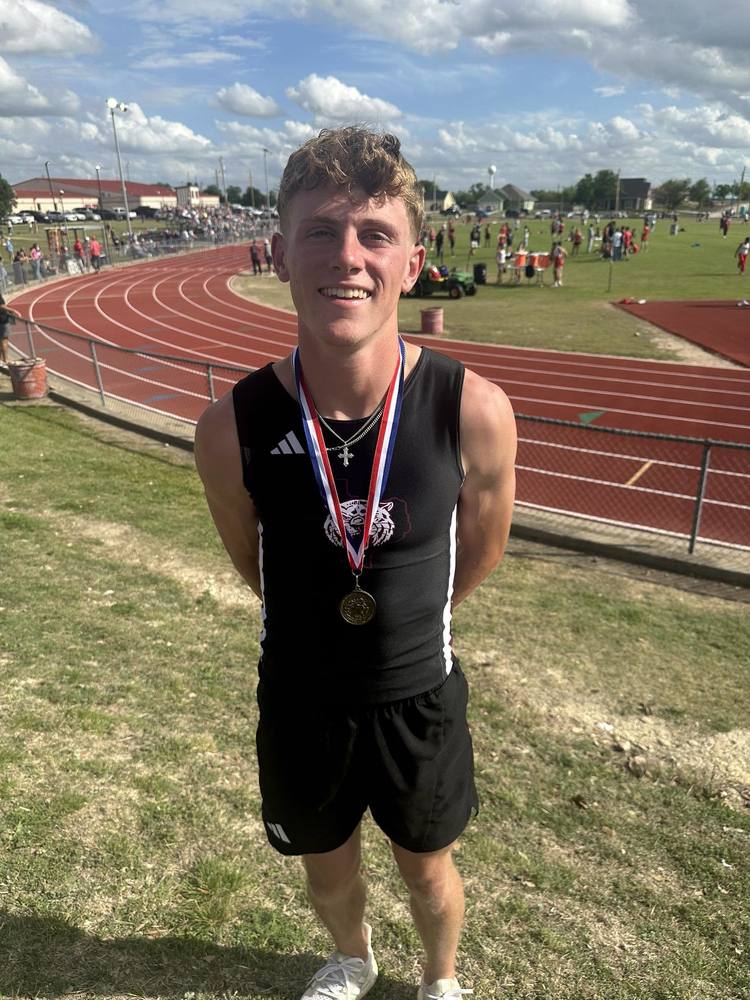 1st place max jones wearing gold medal