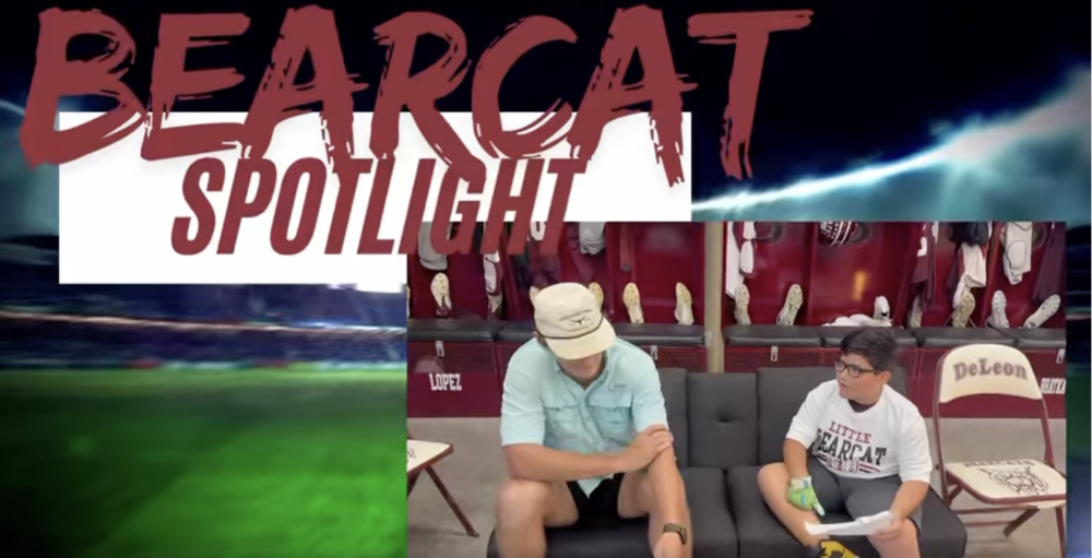 bearcat spotlight interview with bearcat video screenshot featuring football player and elementary student