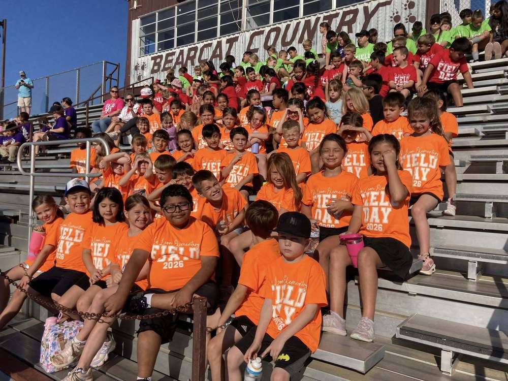 field day group picture in football stands