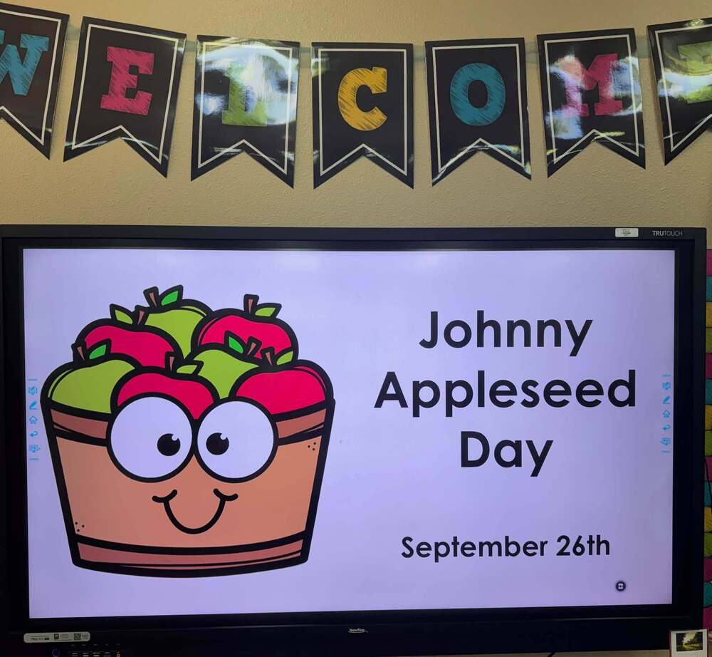 johnny appleseed day september 26th text and basket of apples on display in classroom