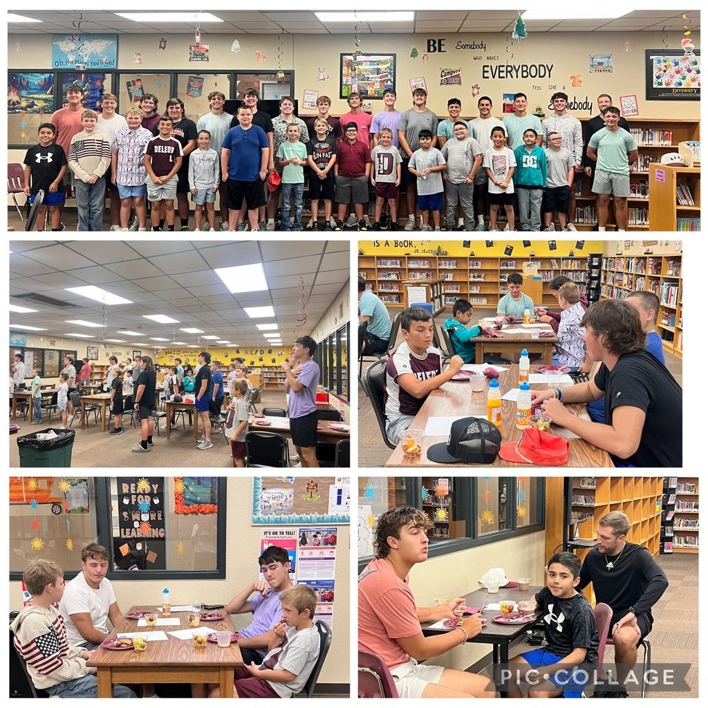 our big and lil bearcats gathered in the library for breakfast