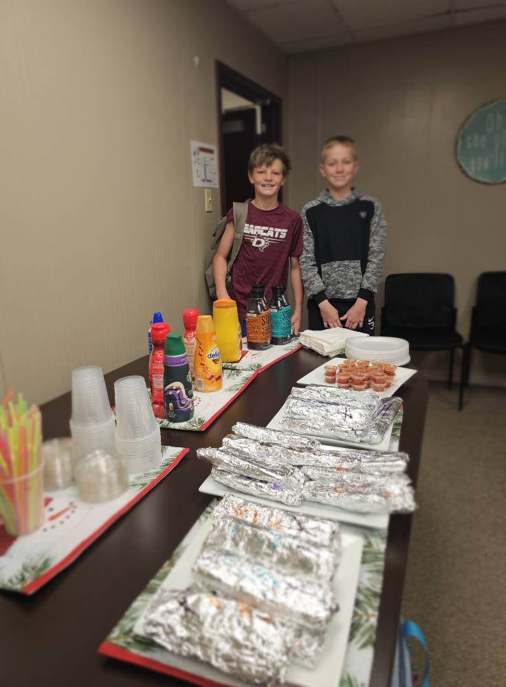 breakfast burrito bar and two students