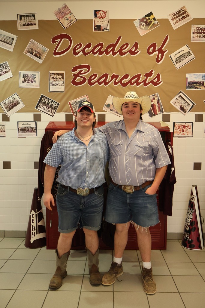 two ffa members standing in hallway