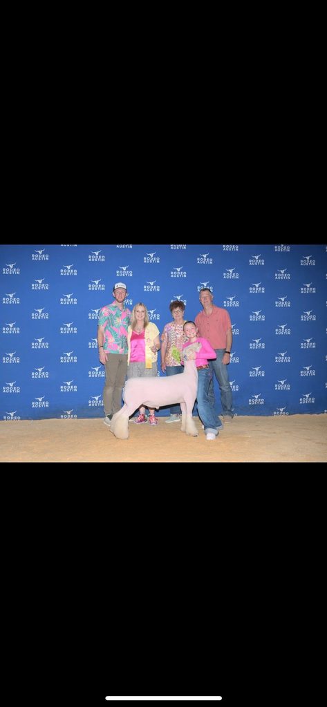 calhoun family and show goat at stock show