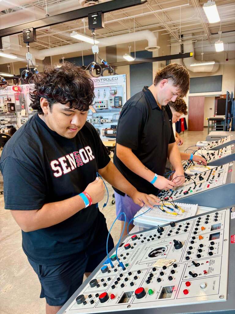 students testing control boards