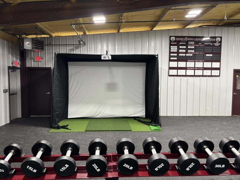 golf simulator in weight room