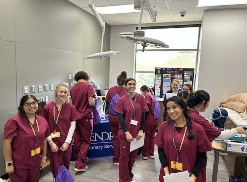 health science students participating in a health science symposium 