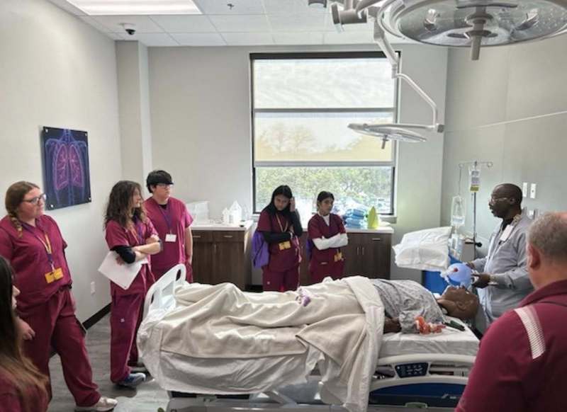 health science students participating in a health science symposium 