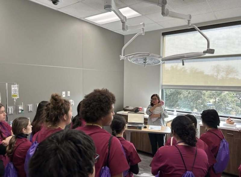 health science students participating in a health science symposium 