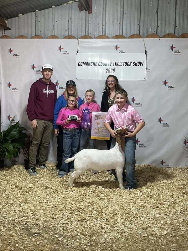 reserve grand champion market goat and student's family