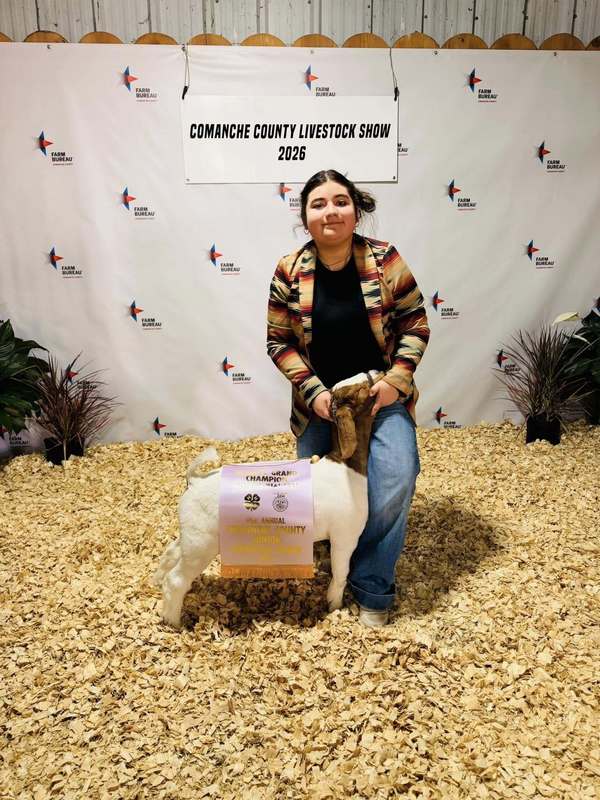 reserve grand champion breeding goat and student