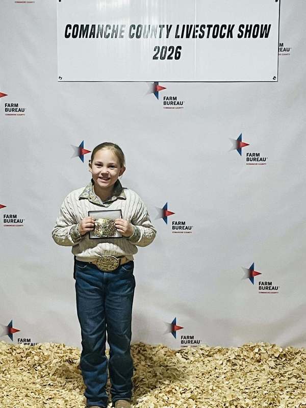 ffa member holding her belt buckle