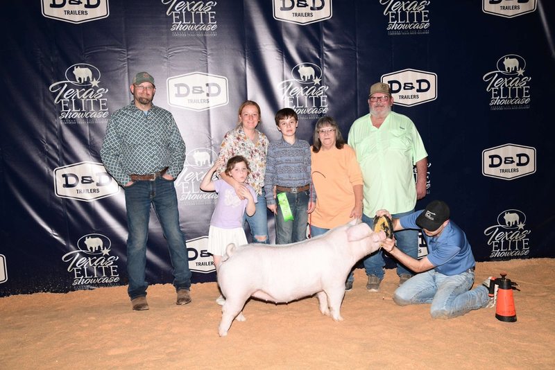 ffa member and their family with winning animal