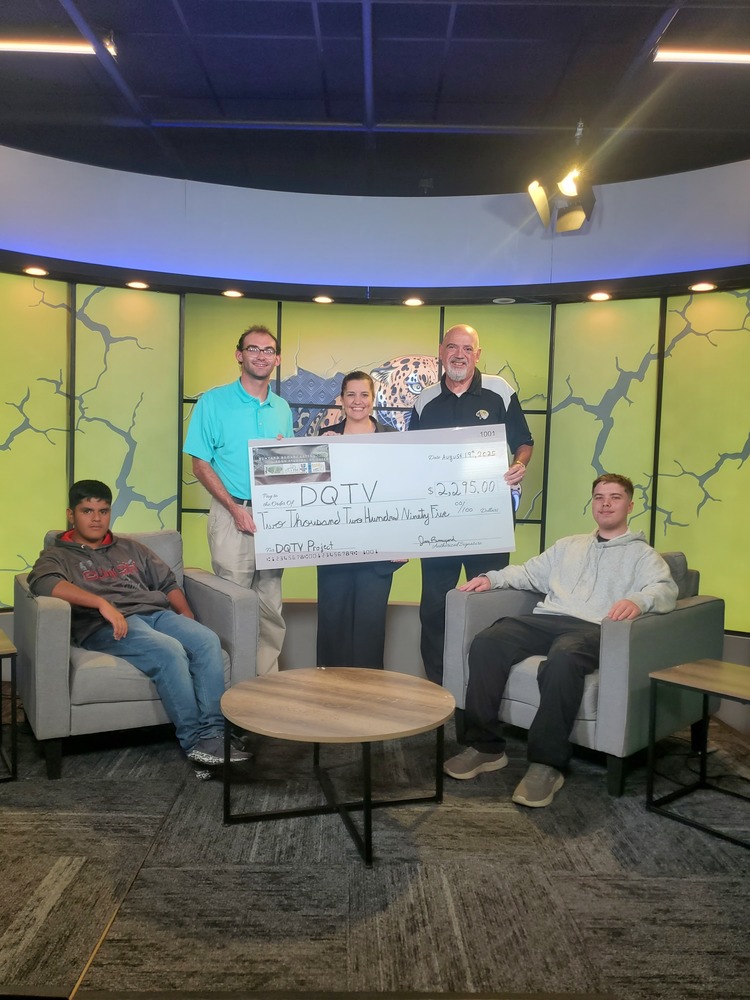 KDQN Partnership Presents Check to DQTV