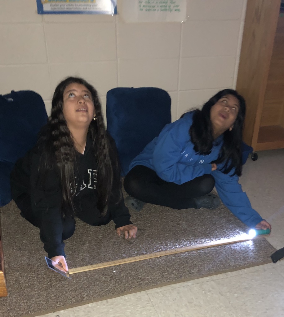 4th grade science class using lightwaves.