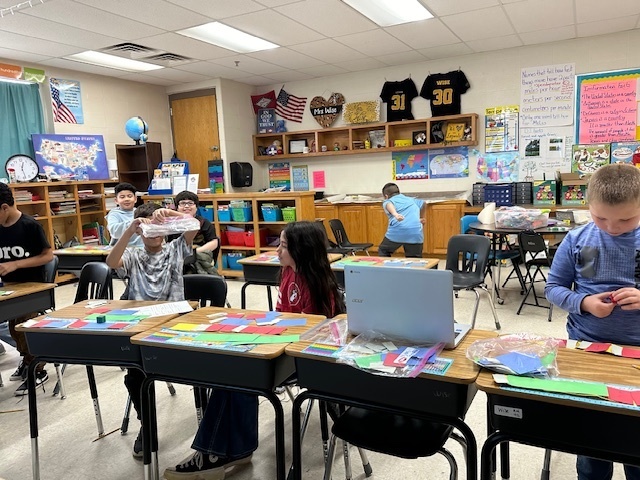 3rd graders studying fractions.